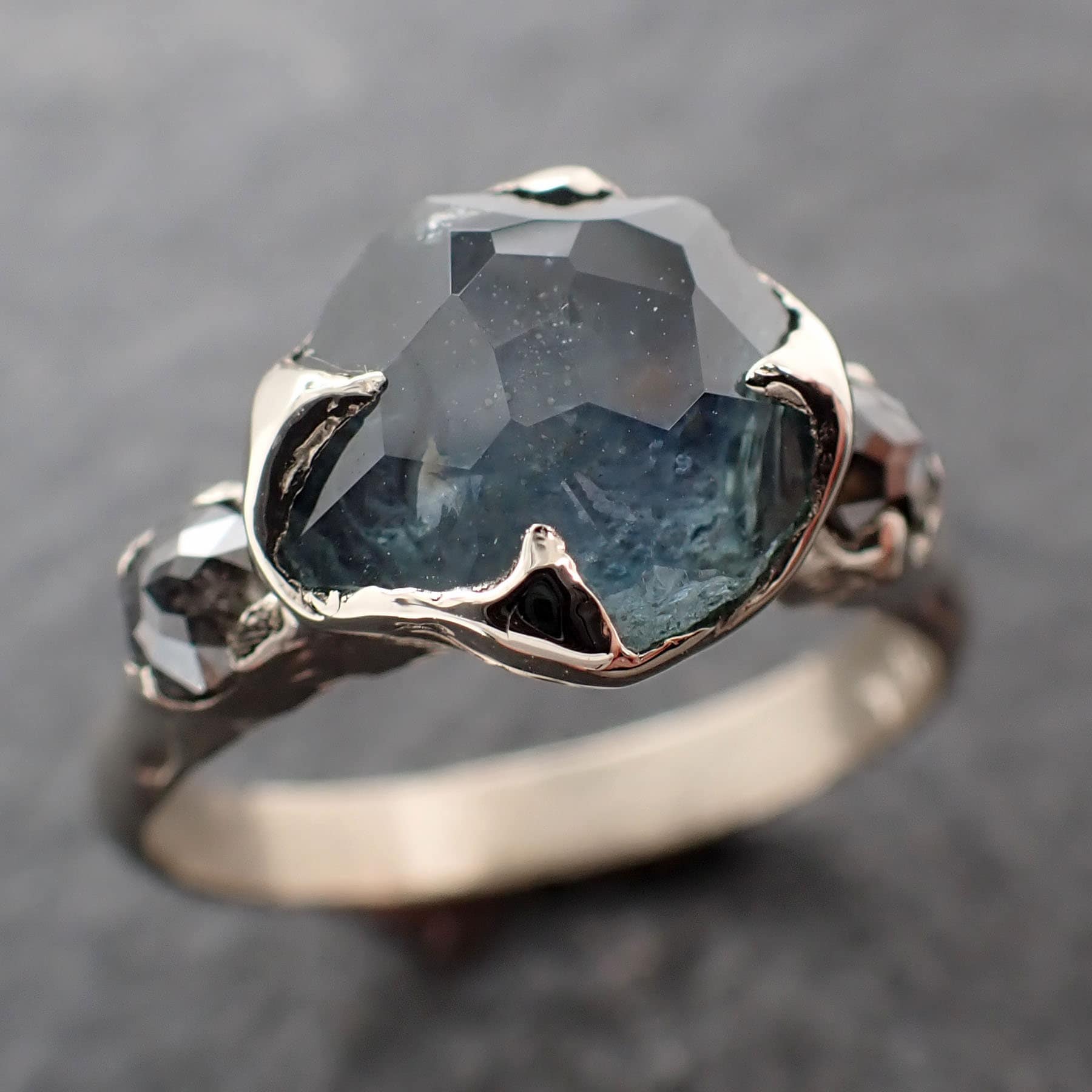 Partially faceted Montana Sapphire and fancy Diamonds 14k White